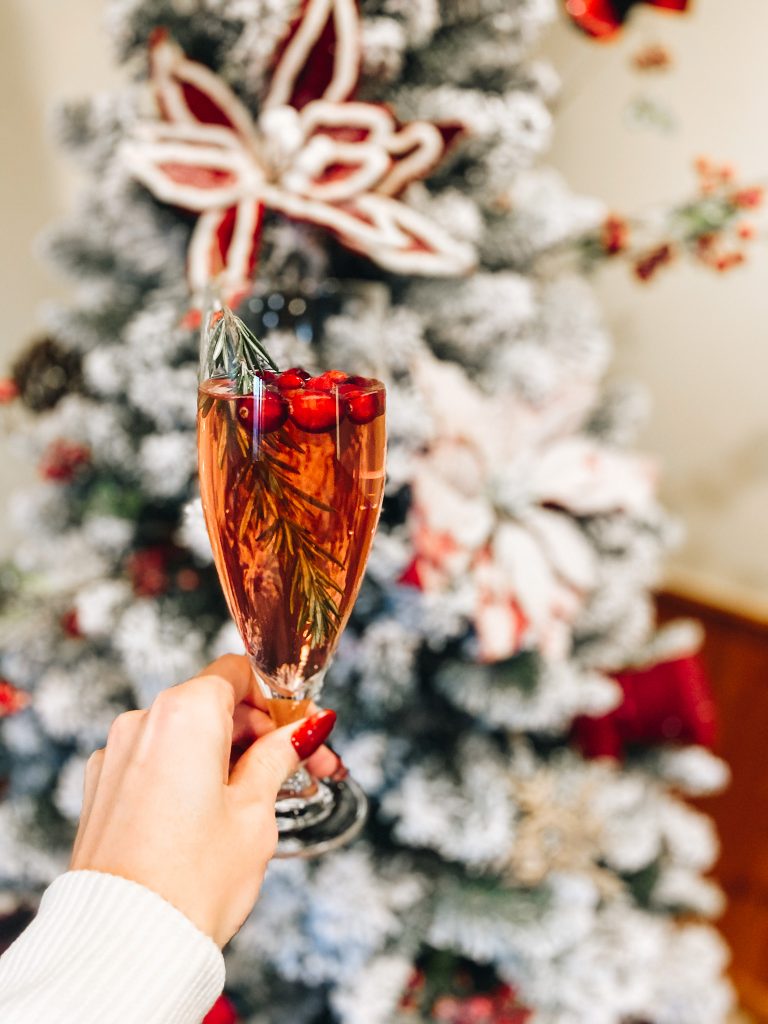 Festive Christmas Poinsettia Cocktail Recipe featured by top Pittsburgh lifestyle blogger, Fashionably Late Mom