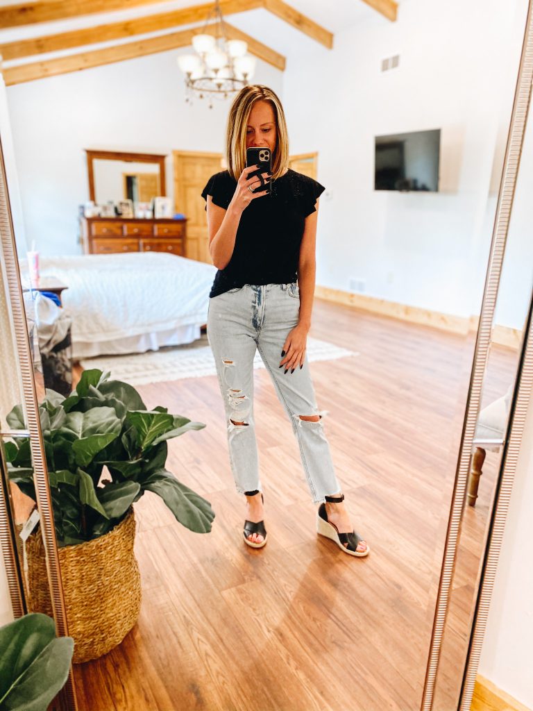 4 Favorite Pairs of Non Skinny Jeans for Women featured by top Pittsburgh mom fashion blogger, Fashionably Late Mom | Non Skinny Jeans by popular Pittsburgh fashion blog, Fashionably Late Mom: image of a woman wearing a black t-shirt, non skinny jeans, and black espadrilles. 