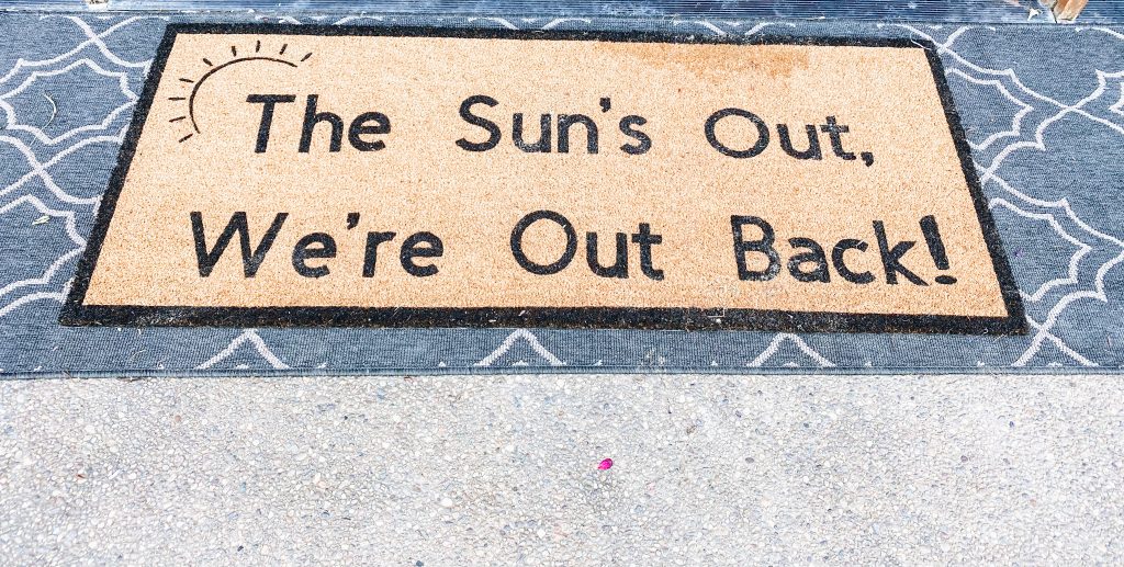 doormat, outdoor rug |  Summer Front Porch by popular Pittsburg life and style blog, Fashionably Late Mom: image of 'The Sun's Out We're Out Back' door mat. 