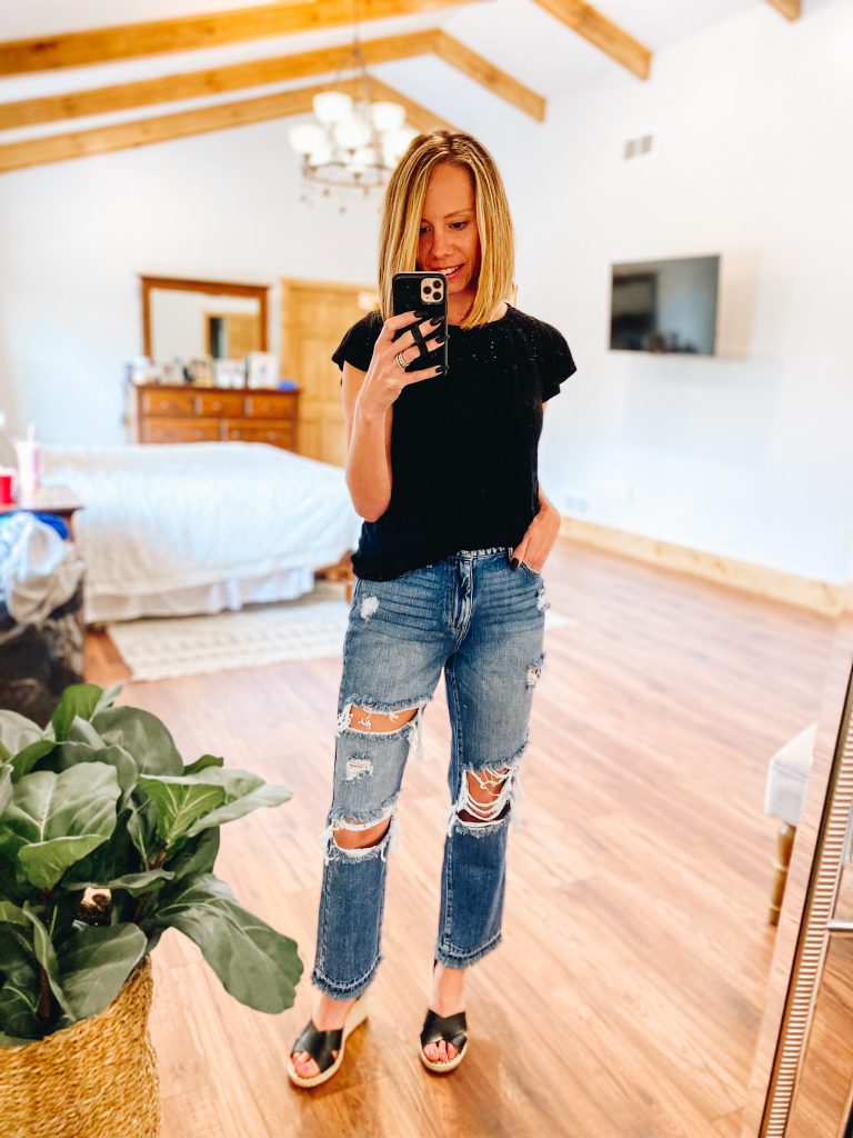 4 Favorite Pairs of Non Skinny Jeans for Women featured by top Pittsburgh mom fashion blogger, Fashionably Late Mom | Non Skinny Jeans by popular Pittsburgh fashion blog, Fashionably Late Mom: image of a woman wearing a black t-shirt, non skinny jeans, and black espadrilles. 