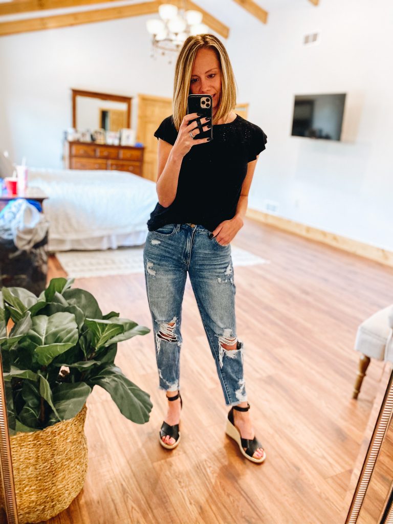 4 Favorite Pairs of Non Skinny Jeans for Women featured by top Pittsburgh mom fashion blogger, Fashionably Late Mom | Non Skinny Jeans by popular Pittsburgh fashion blog, Fashionably Late Mom: image of a woman wearing a black t-shirt, non skinny jeans, and black espadrilles. 