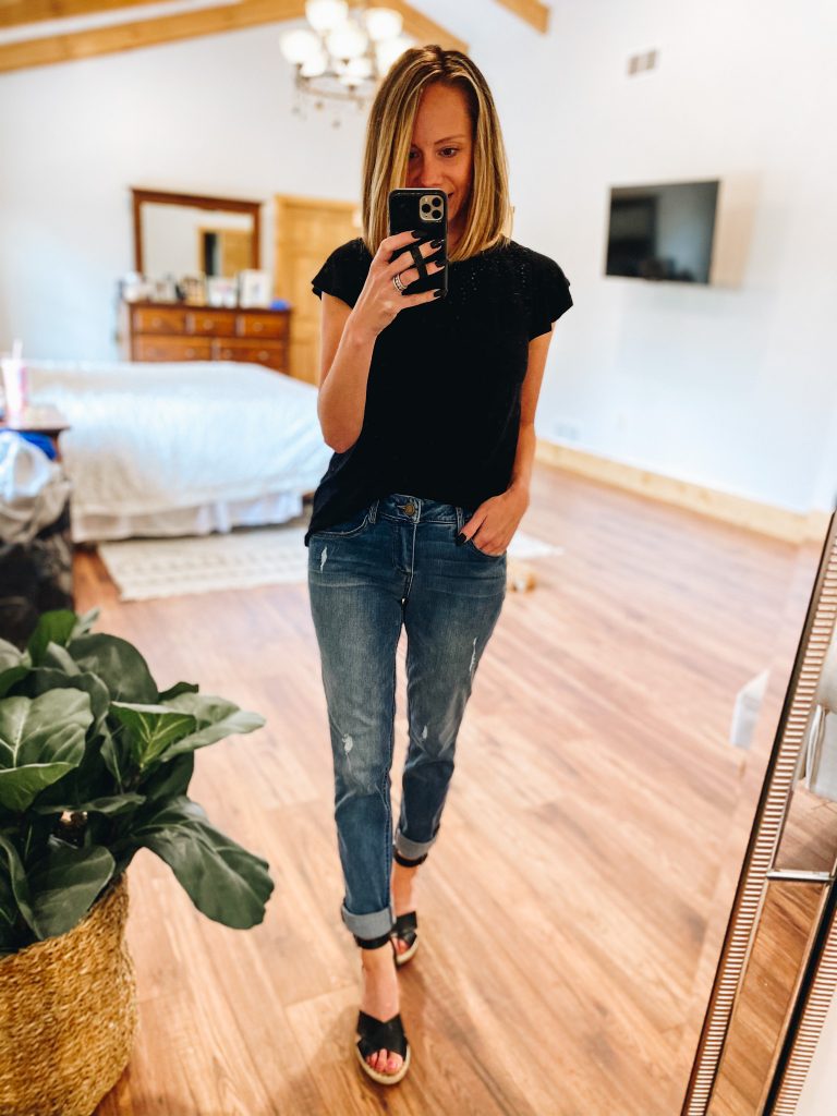 4 Favorite Pairs of Non Skinny Jeans for Women featured by top Pittsburgh mom fashion blogger, Fashionably Late Mom | Non Skinny Jeans by popular Pittsburgh fashion blog, Fashionably Late Mom: image of a woman wearing a black t-shirt, non skinny jeans, and black espadrilles. 
