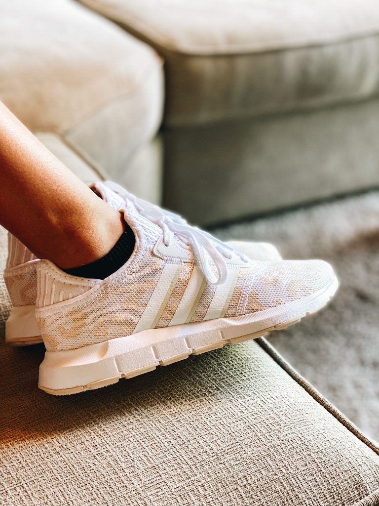 Nordstrom Anniversary Sale 2021: Try On Edition featured by top Pittsburgh fashion blogger, Fashionably Late Mom | Nordstrom Anniversary Sale by popular Pittsburgh fashion blog, Fashionably Late Mom: image of a teenage girl wearing a Nordstrom tan and white leopard print Adidas sneakers. 