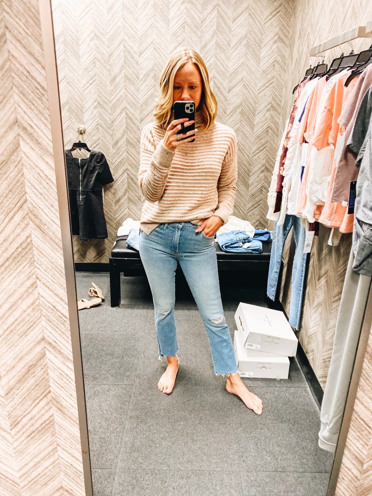 Nordstrom Anniversary Sale 2021: Try On Edition featured by top Pittsburgh fashion blogger, Fashionably Late Mom | Nordstrom Anniversary Sale by popular Pittsburgh fashion blog, Fashionably Late Mom: image of a woman wearing a Nordstrom tan and brown strip sweater and light wash fray hem jeans. 