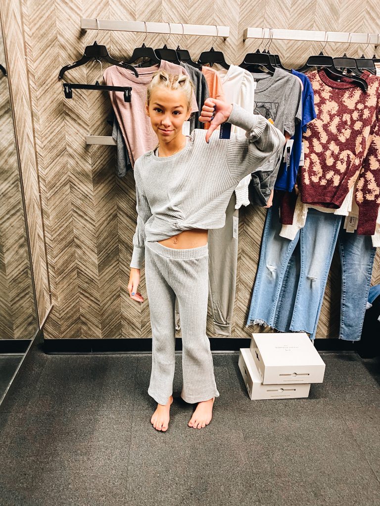 Nordstrom Anniversary Sale 2021: Try On Edition featured by top Pittsburgh fashion blogger, Fashionably Late Mom | Nordstrom Anniversary Sale by popular Pittsburgh fashion blog, Fashionably Late Mom: image of a teenage girl wearing a Nordstrom ribbed knit sweater set. 
