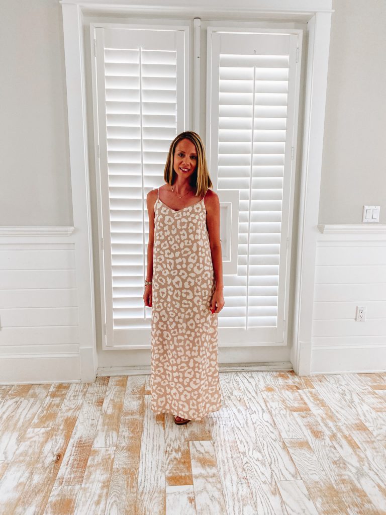 Pink Lily, 30A packing list, maxi dress, vacation outfits | 30A Packing List by popular Pittsburgh life and style blog, Fashionably Late Mom: image of a woman wearing a Pink Lily leopard print maxi dress. 