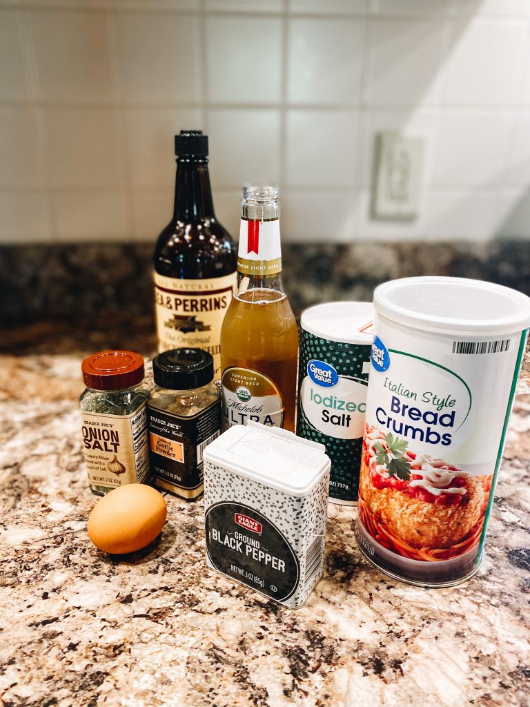 meatloaf recipe ingredients, dinner ideas | Sweet and Spicy Meatloaf by popular Pittsburgh lifestyle blog, Fashionably Late Mom: image of onion salt, a brown egg, black pepper, Italian Style bread crumbs, Iodized salt, bottle of beer, and Lea and Perrins Worcestershire sauce. 