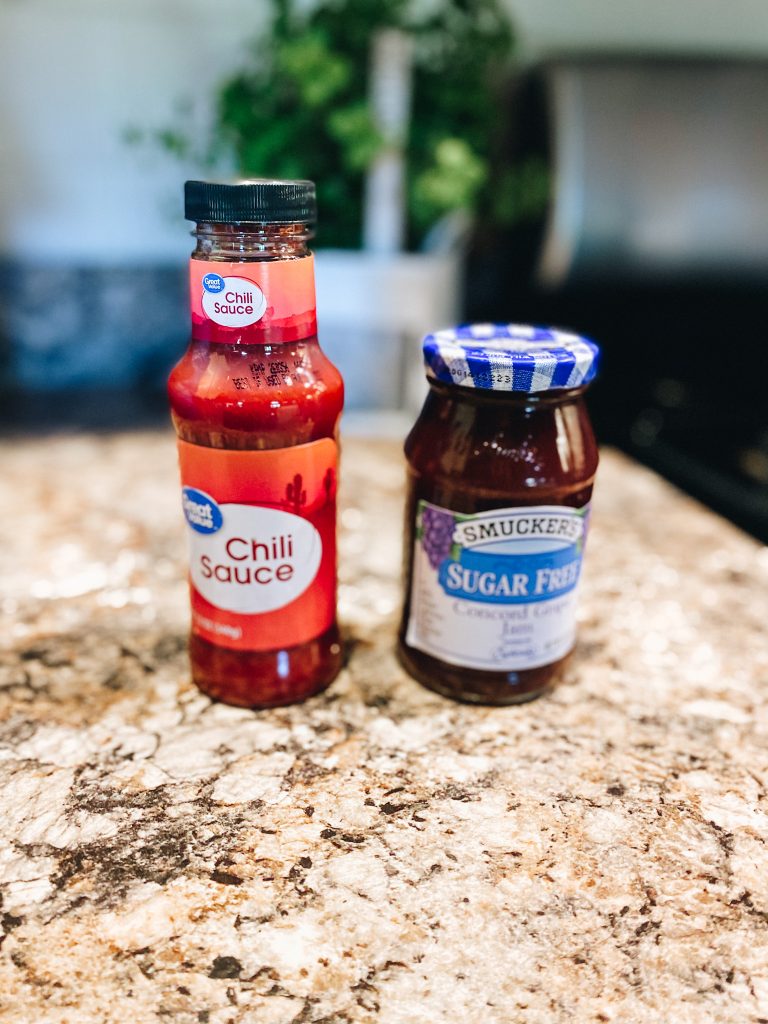 meatloaf sauce | Sweet and Spicy Meatloaf by popular Pittsburgh lifestyle blog, Fashionably Late Mom: image of chili sauce and concord grape jam. 
