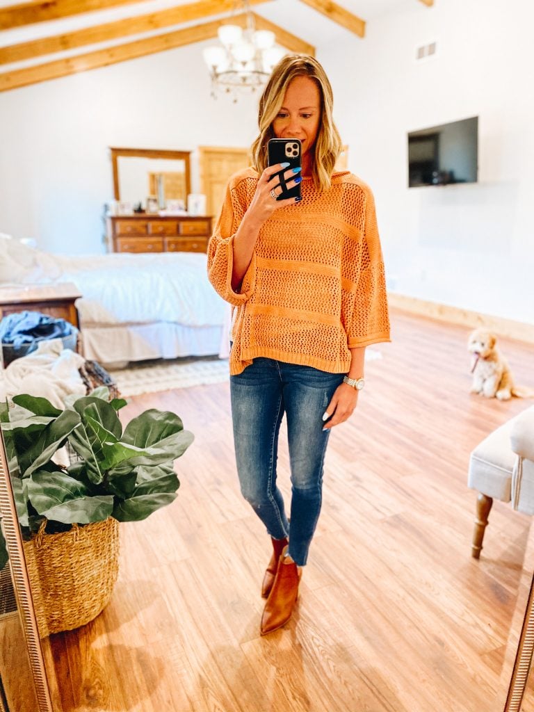poncho, fall style, kut from the kloth jeans, business casual outfits, working mom fashion | Working Mom Outfits by popular Pittsburgh fashion blog, Fashionably Late Mom: image of a woman wearing a orange knit poncho, jeans, and brown ankle booties.