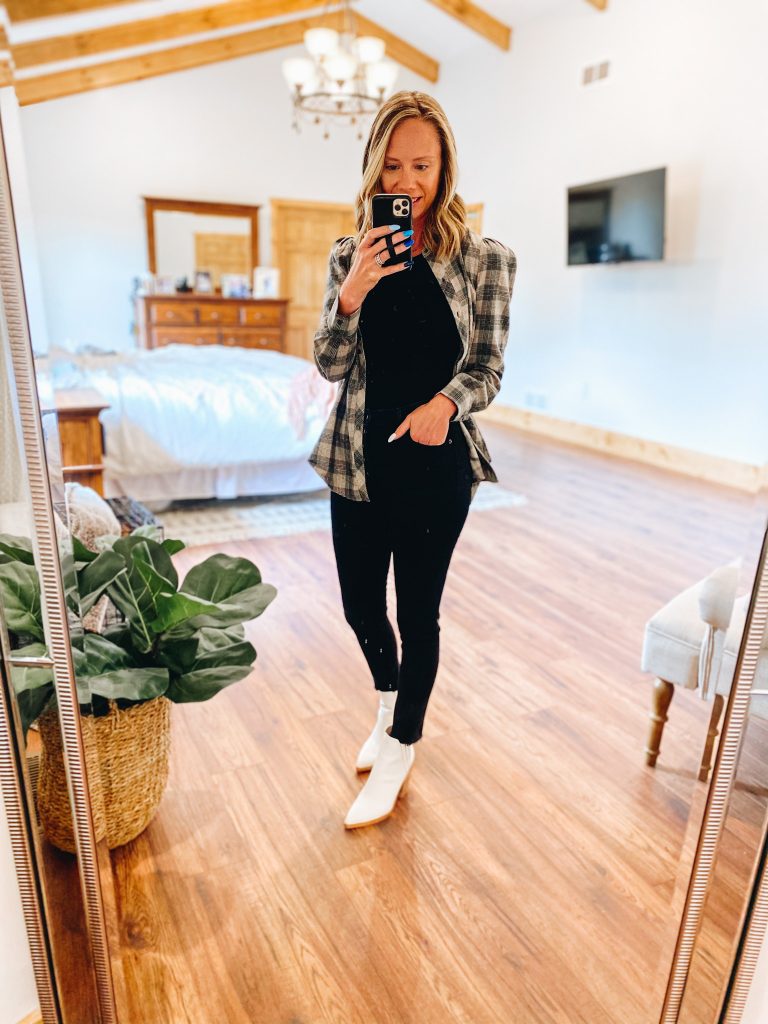 fall style, black denim, womens flannel top | Gibson Clothing by popular Pittsburgh fashion blog, Fashionably Late Mom: image of a woman wearing a black top, black pants, white ankle boots, and black and cream plaid shirt.