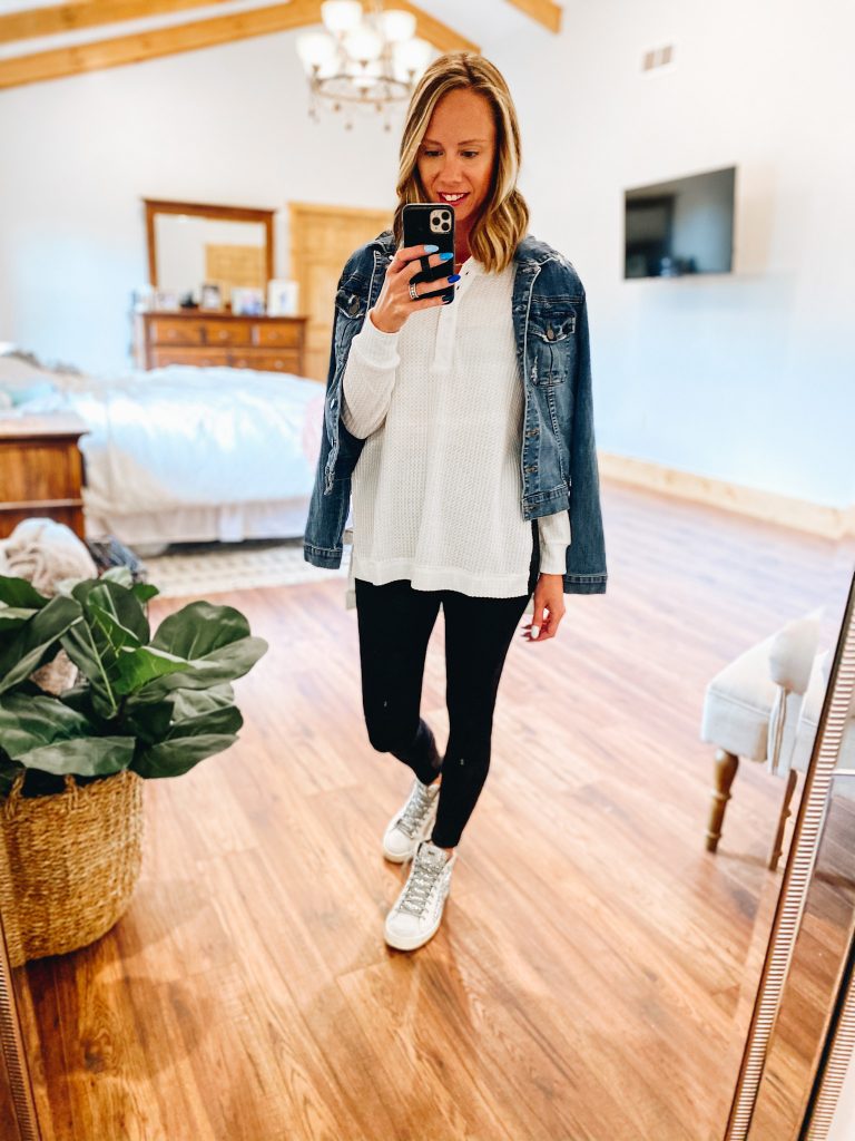 fall fashion, denim jacket, spanx leather leggings, | Gibson Clothing by popular Pittsburgh fashion blog, Fashionably Late Mom: image of a woman wearing a white long sleeve knit top, black Spanx leggings, BP sneakers, and a denim jacket.