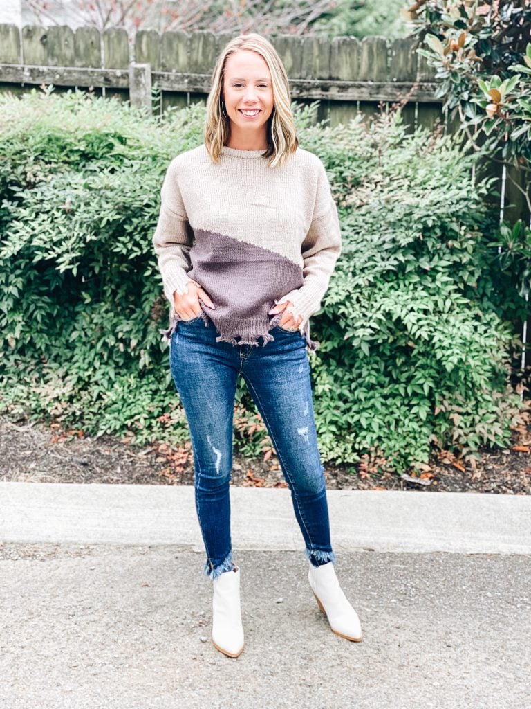Pink Lily Autumn Awaits Collection, fall fashion, sweaters | Pink Lily by popular Pittsburgh fashion blog, Fashionably Late Mom: image of a woman wearing a Pink Lilly color block sweater, distressed jeans, and white ankle boots. 