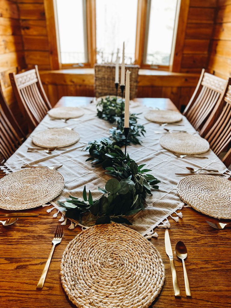 how to decorate a table for spring, eucalyptus garland, gold silverware, modern farmhouse decor