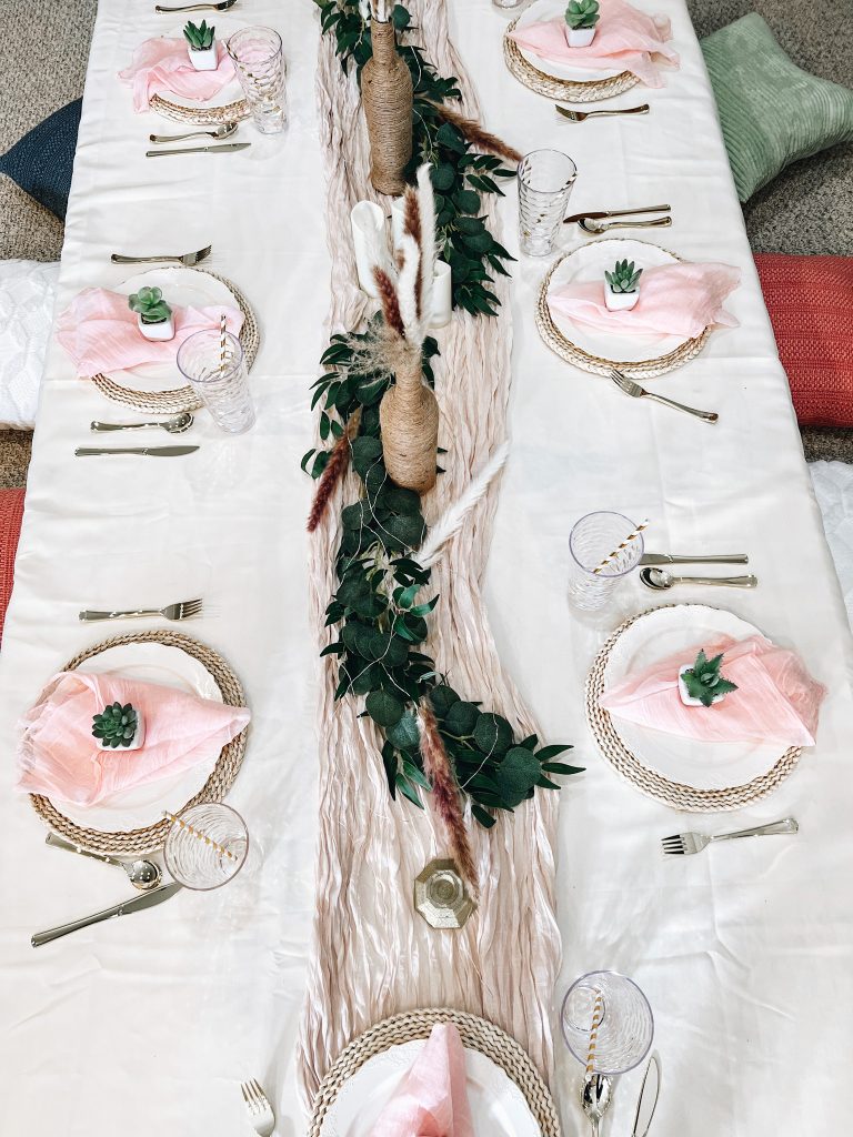 how to decorate for a teen girl birthday, balloon arch, boho chic birthday party, floor table, amazon party decor
