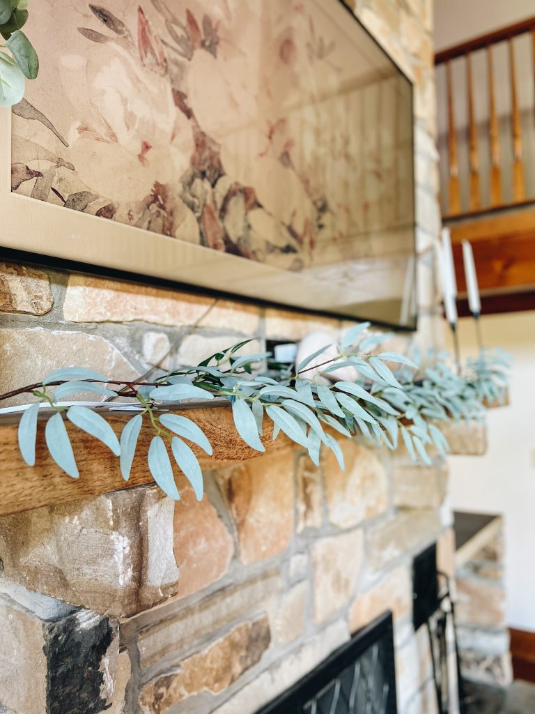 mantle garland, stone fireplace