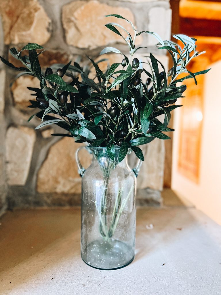 glass vase, olive branches