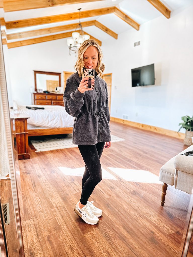 sherpa jacket, black leggings, neutral sneakers
