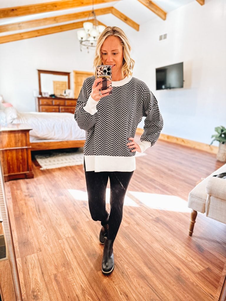 black and white sweater, spanx faux leather leggings, chelsea boots