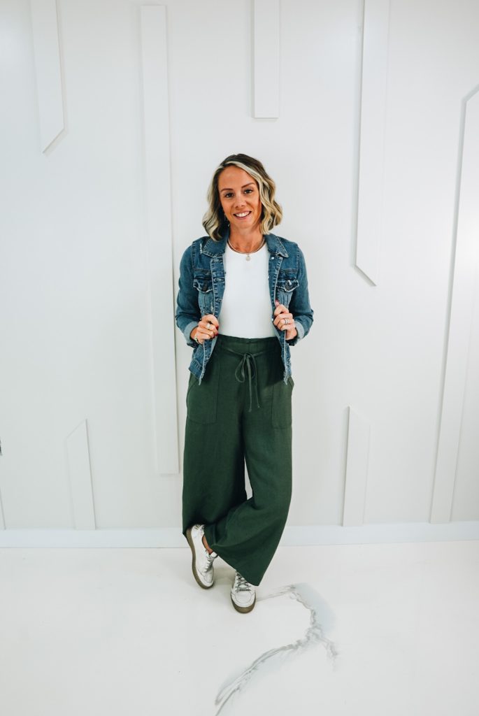 wide leg green linen pants, white bodysuit, golden goose sneakers, denim jacket