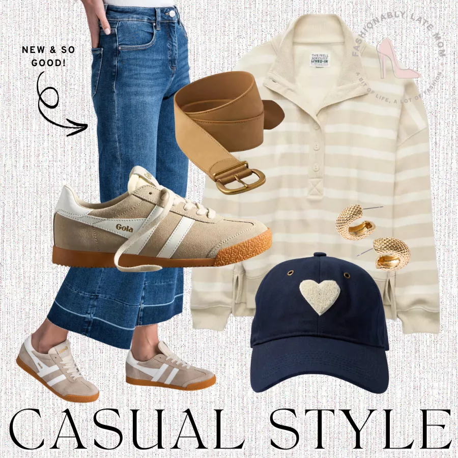 Flat lay of a casual outfit featuring beige Gola sneakers, wide-leg jeans, a striped pullover, a brown belt, a navy cap with a heart design, and gold hoop earrings on a textured background.