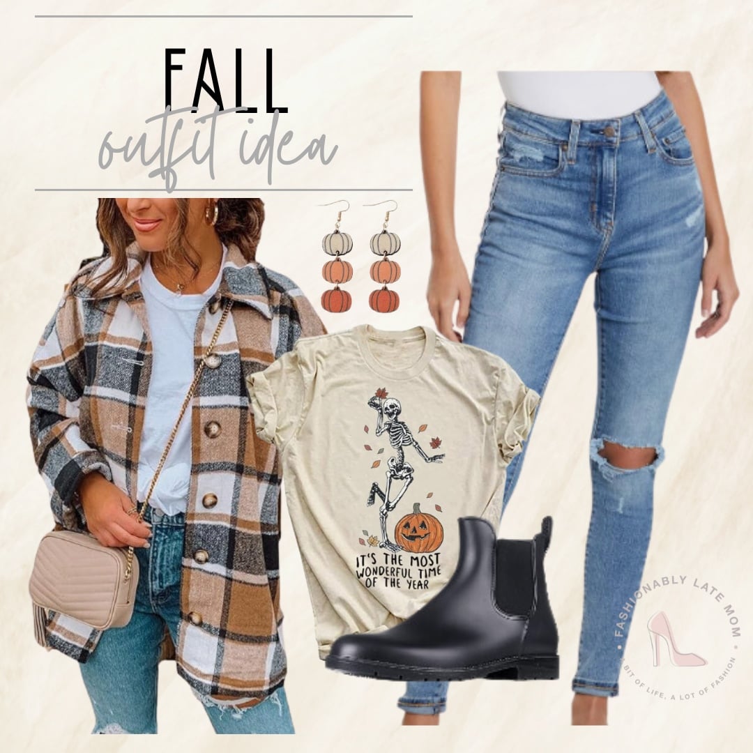 Cream Halloween graphic tee layered under a plaid shacket with jeans and Chelsea boots