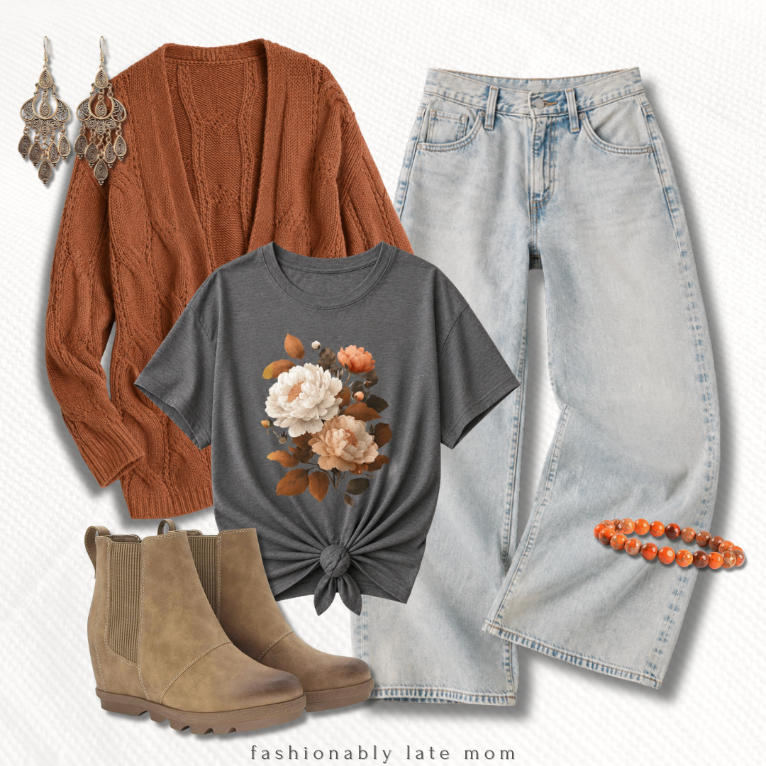 rust cable-knit cardigan fall outfit with a floral graphic tee, light jeans and wedge booties