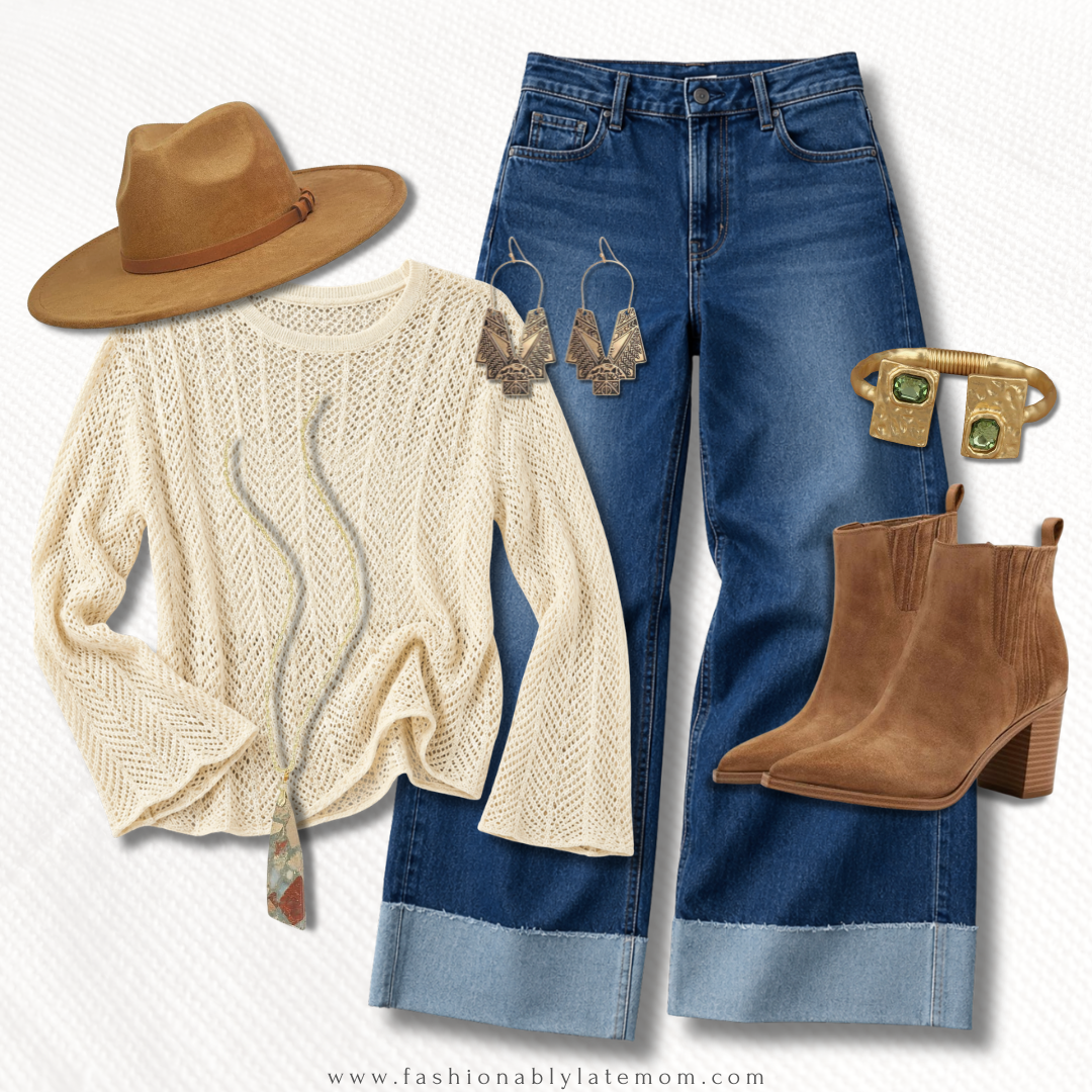 fall outfit with cream open-knit sweater, cuffed wide-leg jeans, suede ankle booties, and a camel wide-brim hat