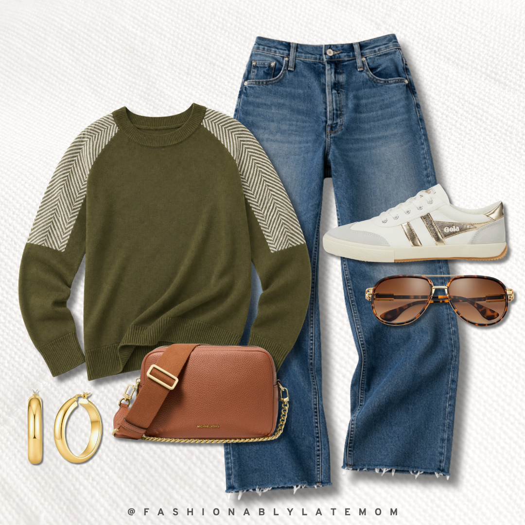 casual fall outfit with an olive herringbone-sleeve sweater, wide-leg jeans, gold-stripe sneakers and a cognac crossbody bag