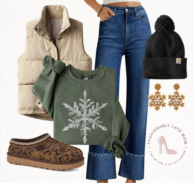 Tan puffer vest over a green snowflake sweatshirt with wide leg jeans, a black beanie and leopard slippers