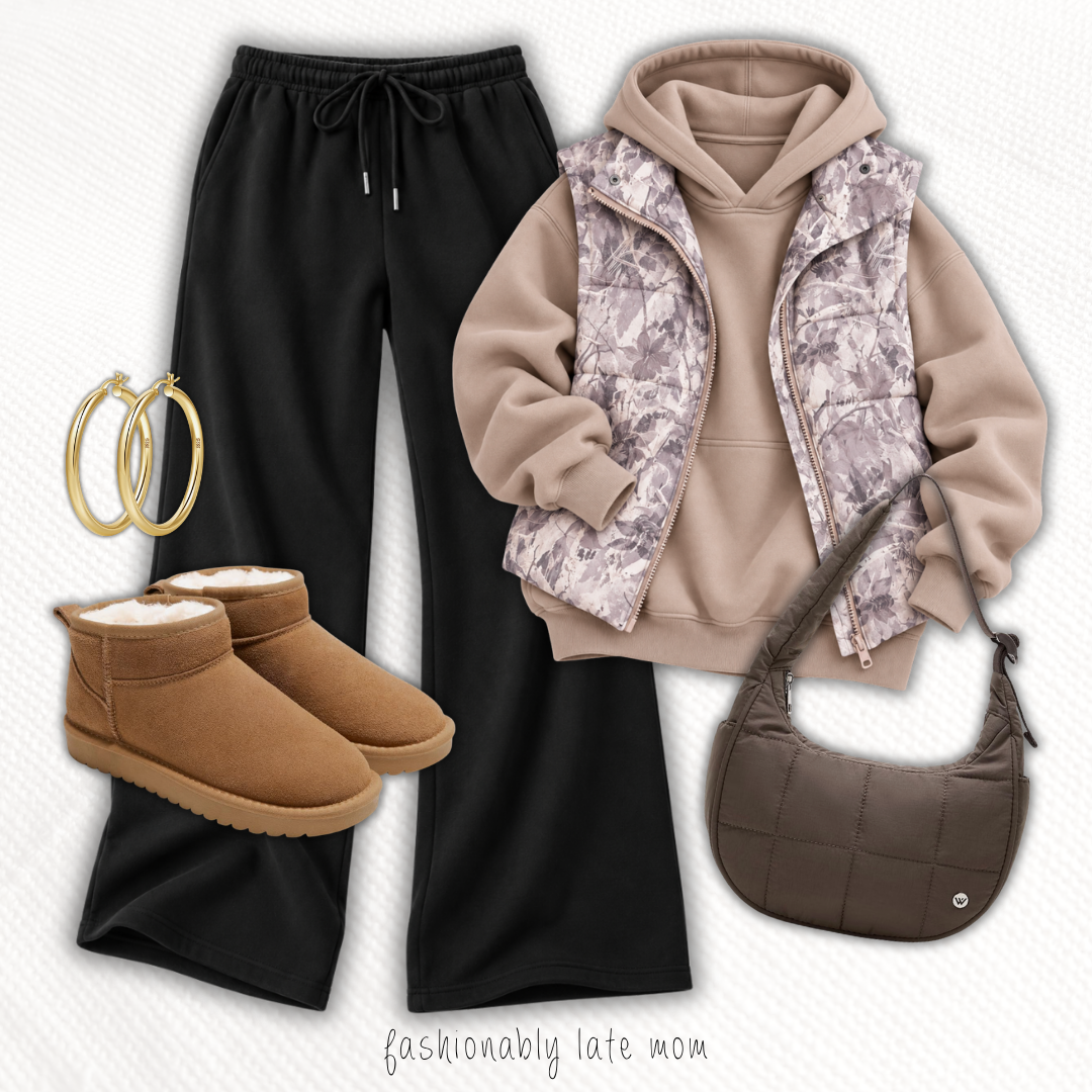 Printed puffer vest over a taupe hoodie with black wide leg sweatpants and UGG mini boots