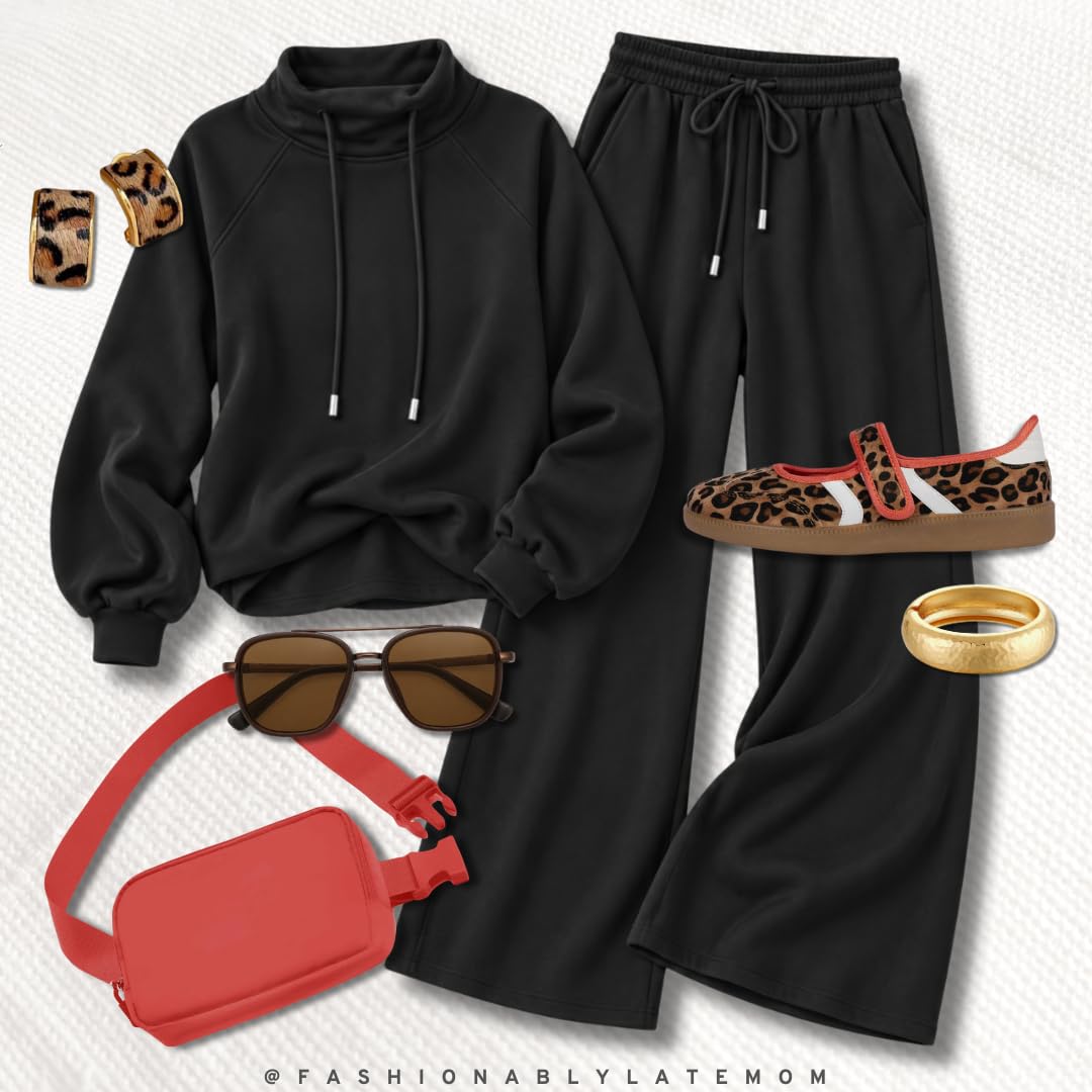 Black half zip and wide leg sweatpants set with a red belt bag and leopard sneakers